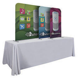 Group of Eurofit tabletop banner stands with stretch fabric graphic banners.